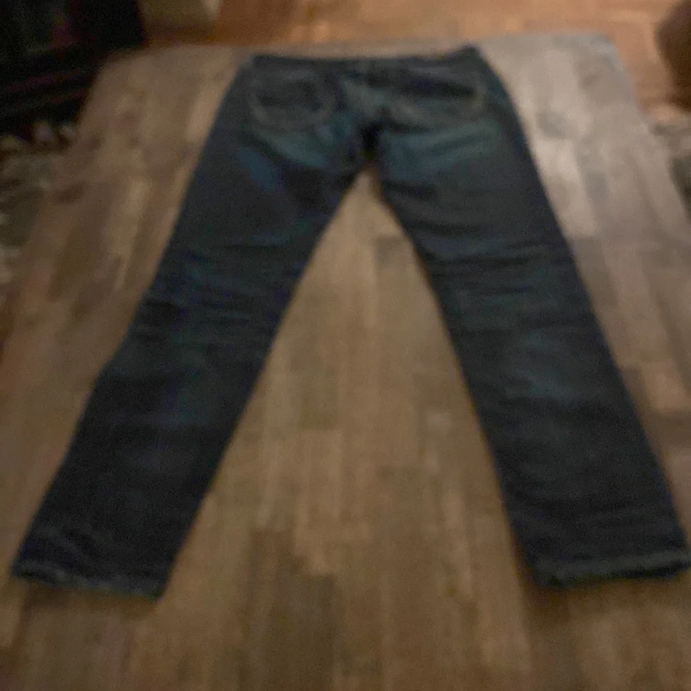 All Saints Spitalfields Jack’s Place skinny dark blue jeans from Neiman Marcus